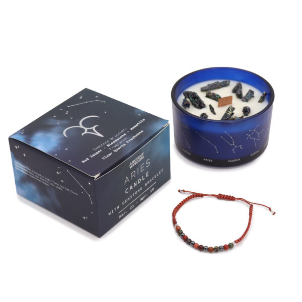 Midnight blue soy wax zodiac candle with silver-embossed constellation design, wooden crackle wick, Peruvian pyrite decoration, and gemstone bracelet for [Zodiac Sign]. Presented in a luxury silver-embossed gift box."